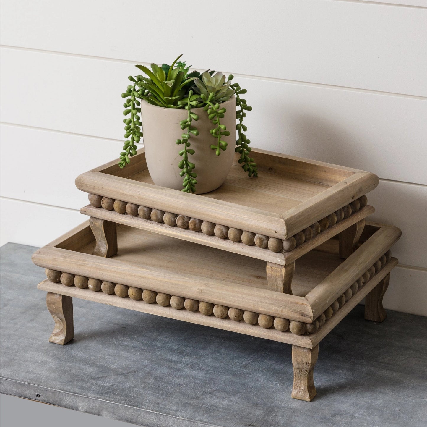 Beaded wood risers