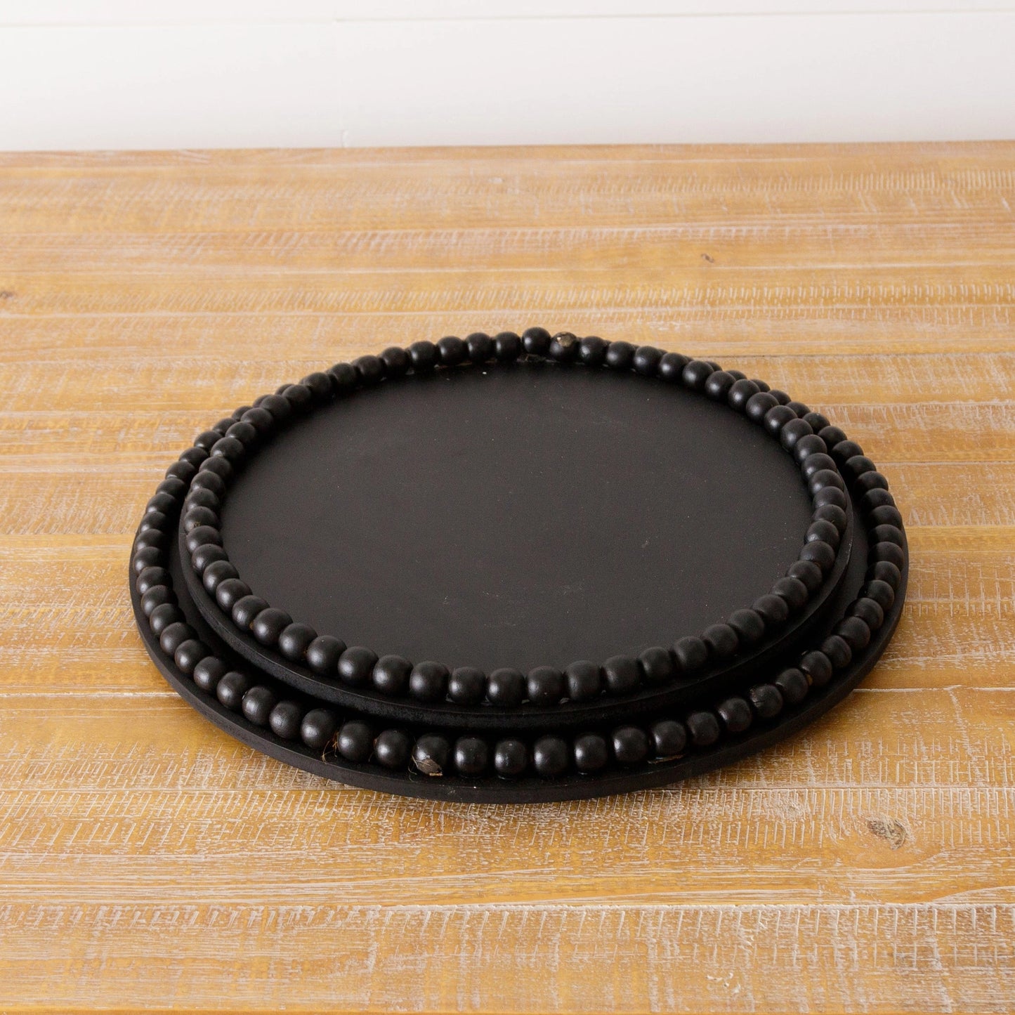 Round beaded black tray